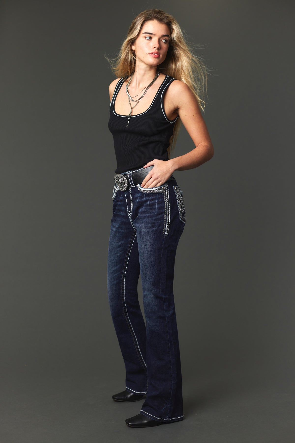 Front three-quarter view of Answer Me A1145 dark-wash bootcut jeans