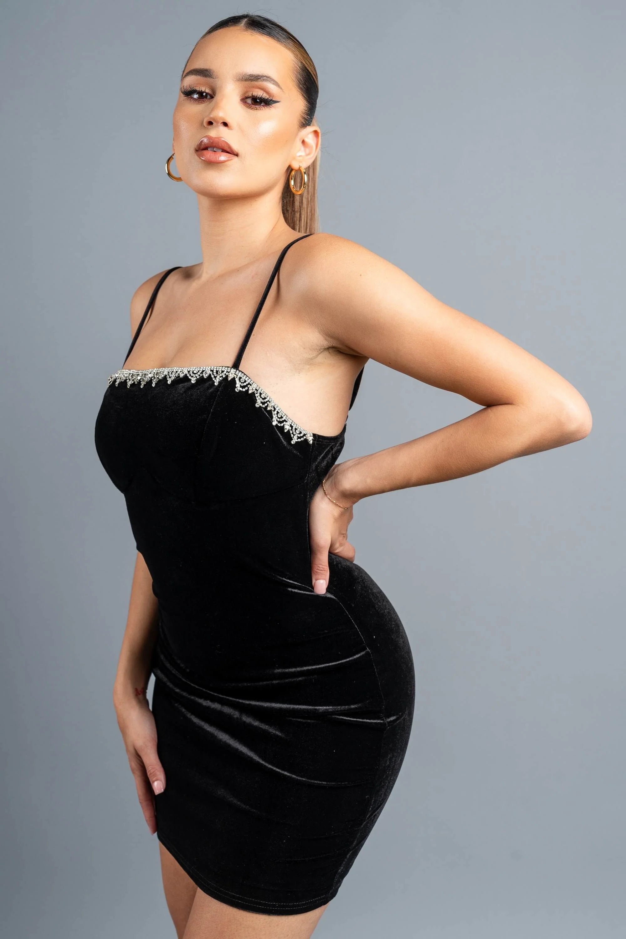 Velvet mini dress with rhinestone trim by Privy, featuring a fitted silhouette and stylish design, shown on a model.