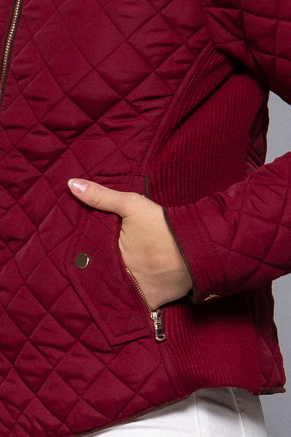Active USA quilted suede piping jacket in dark wine color, showcasing its textured fabric and stylish design.