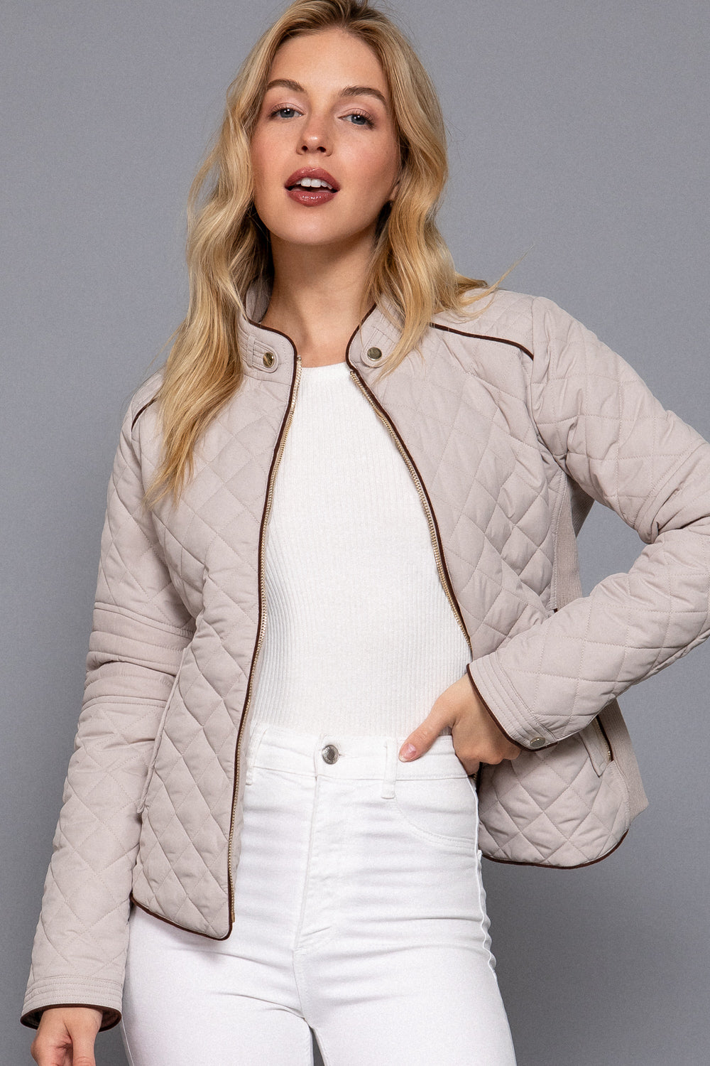 Quilted suede piping jacket in taupe from Active USA, featuring a stylish design and textured fabric.