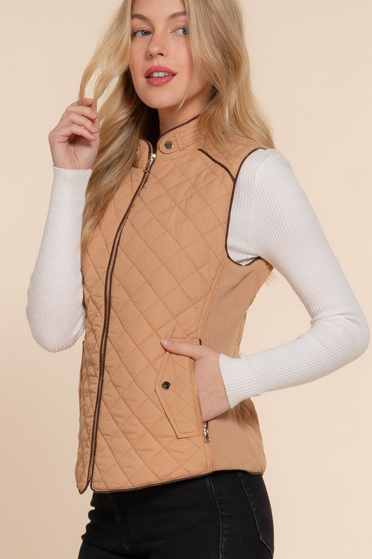 Active USA suede piping detail quilted padding vest, outwear with ribbed collar and padding, shown in a close-up view.