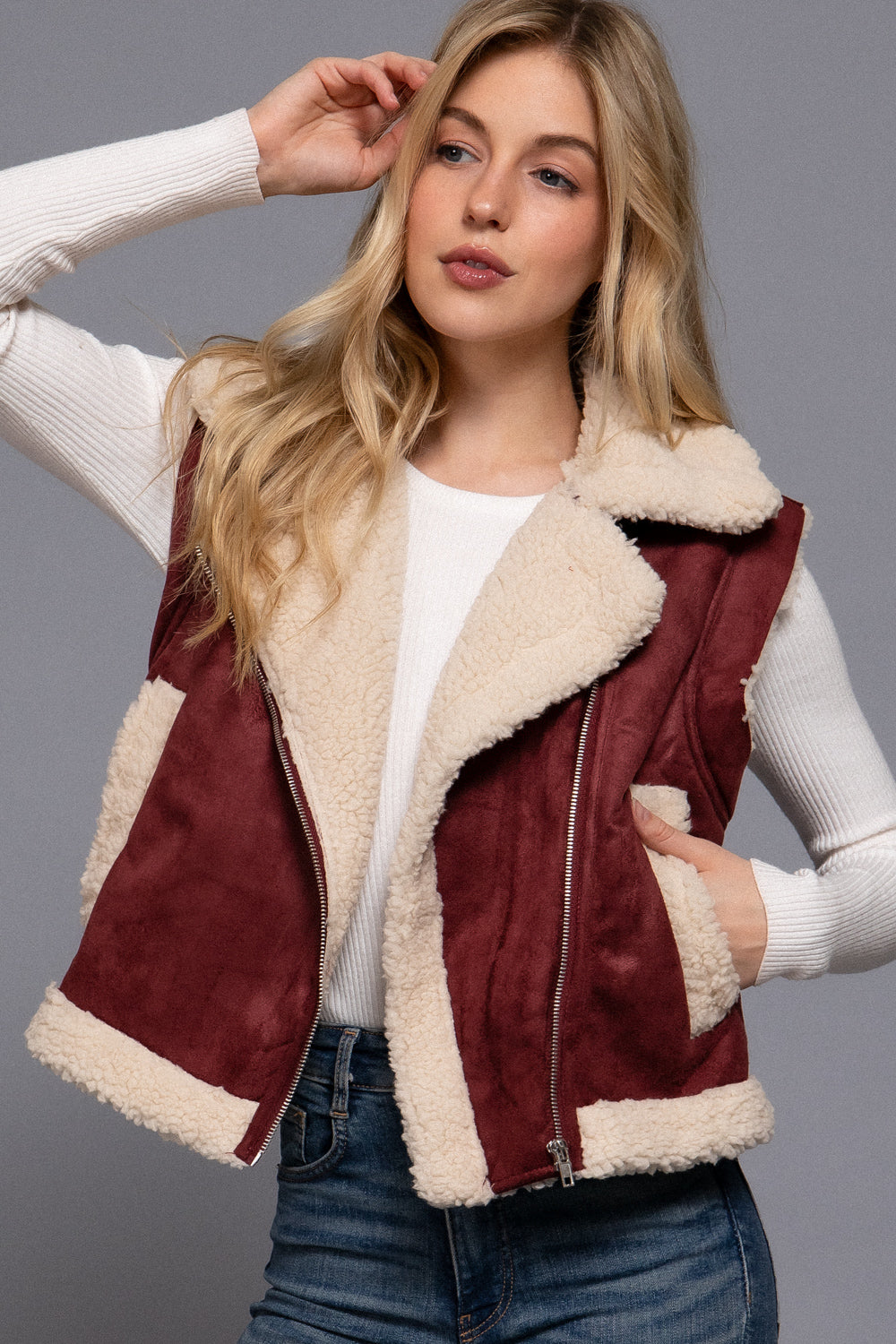 Burgundy faux suede zip-up vest with cozy sherpa lining, stylish and warm, from Active USA.