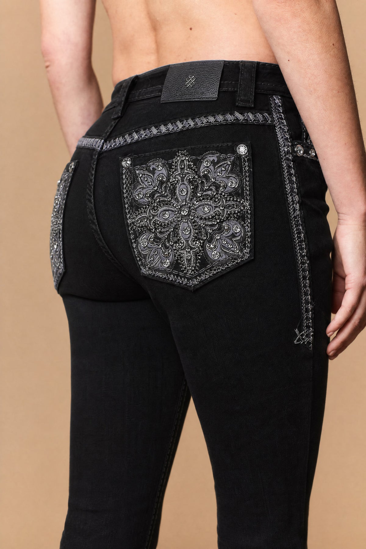 Back pocket medallion embroidery detail on Western Blue W268 black jeans