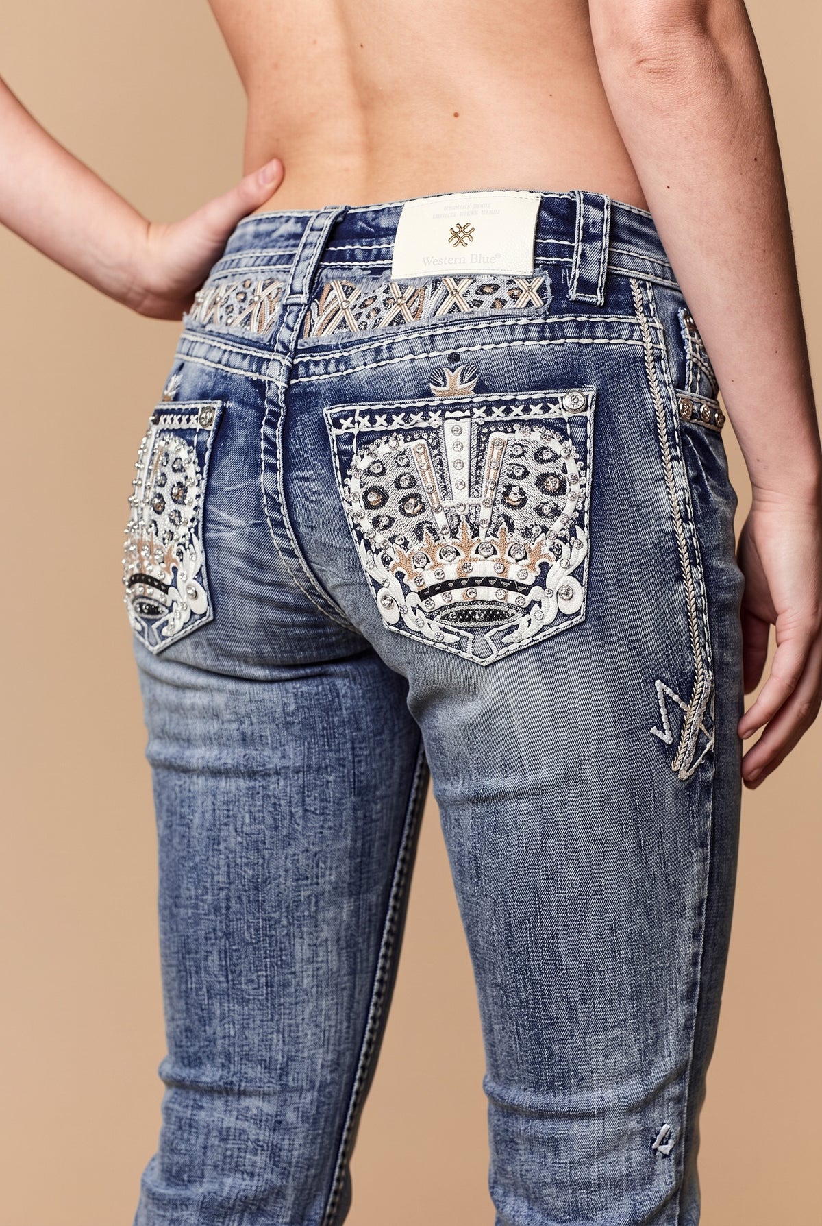 Back crown-embroidered pocket detail on Western Blue W265 light-wash jeans