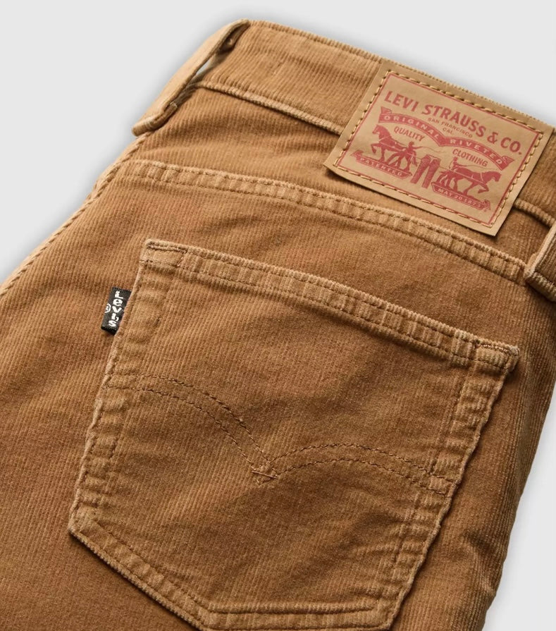Levi's 725 high-rise bootcut corduroy women's jeans in a classic fit with wide legs and textured fabric.