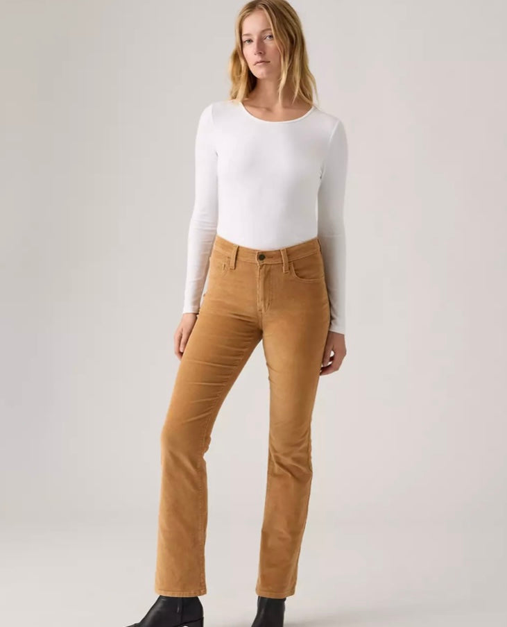 Levi's 725 high-rise bootcut corduroy women's jeans, showing the classic fit and textured fabric in a natural pose.