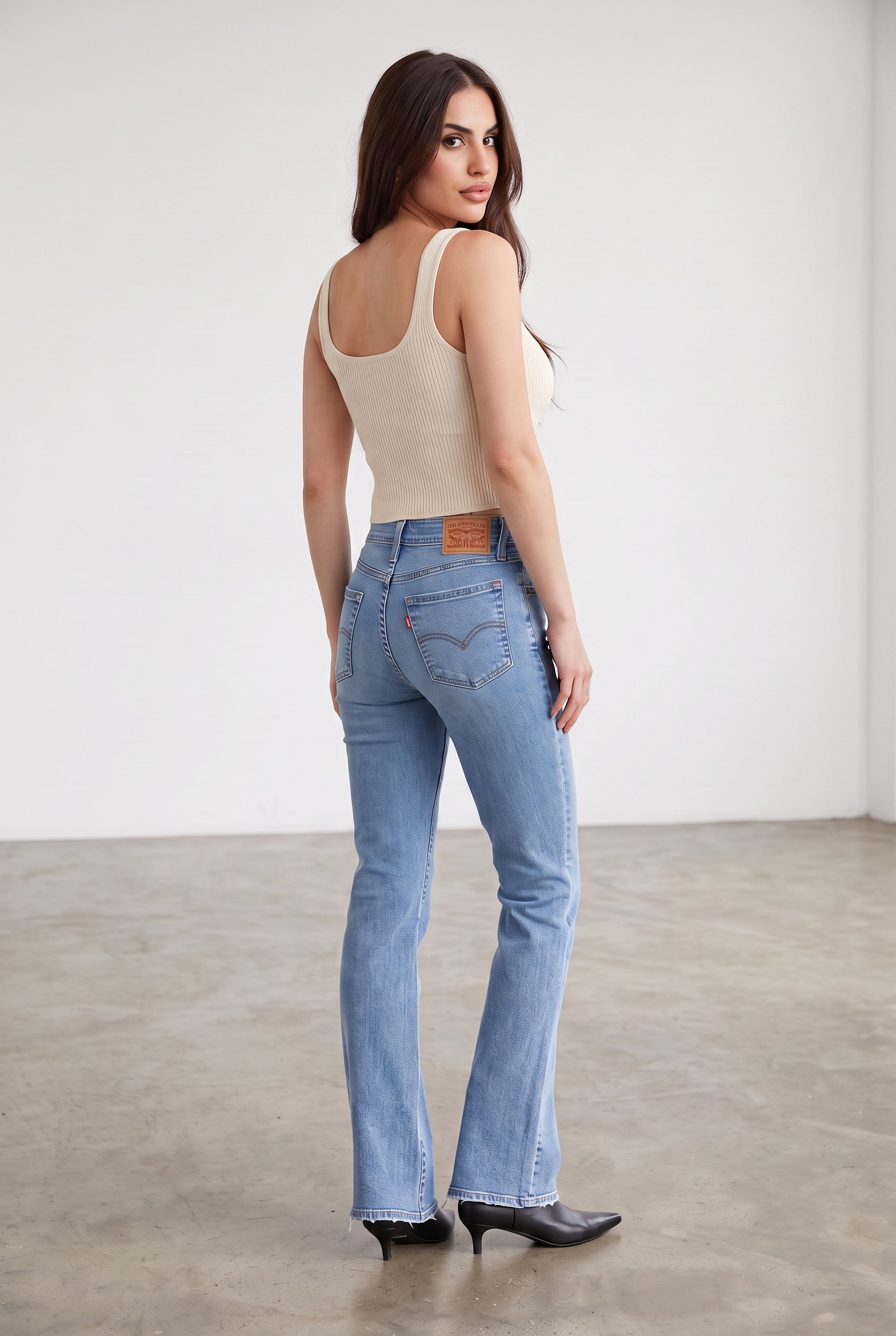 Levi’s 725 High-Rise Bootcut Jeans in Total Freedom medium wash – virtual model three-quarter back view