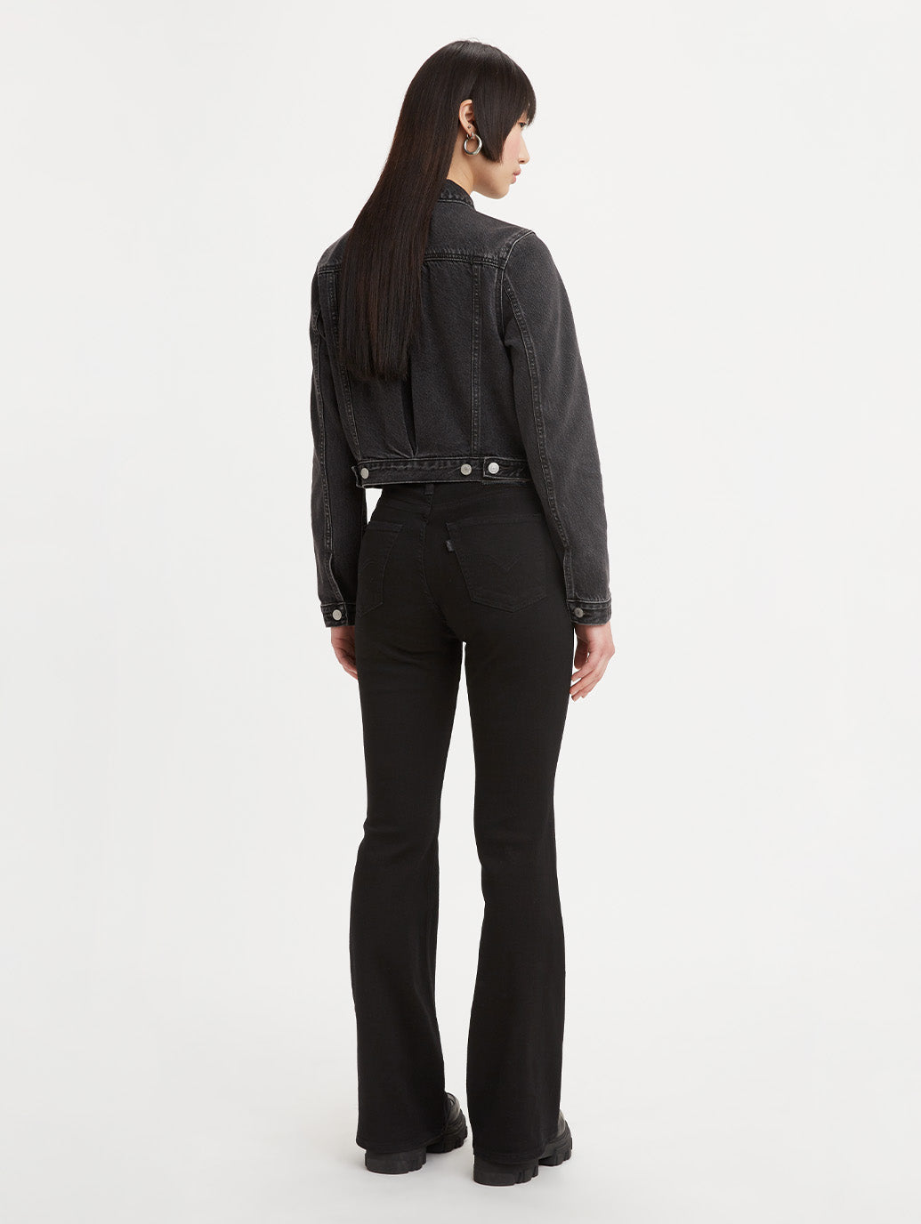 Levi's 726 high-rise flare jeans in Soft Black, back view on model.