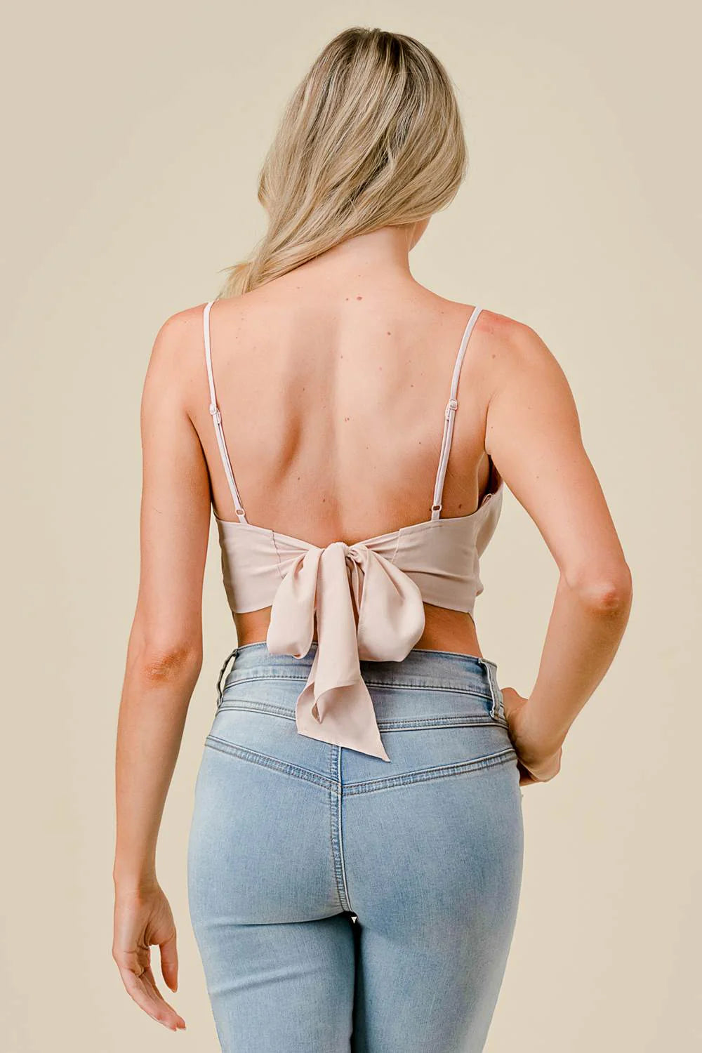 Privy cowl neck back-tie cropped top shown in the image, featuring a relaxed fit, soft fabric, and stylish back tie detail.