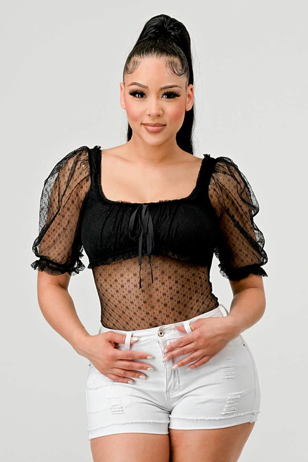 Front view of black square-neck floral-mesh bodysuit