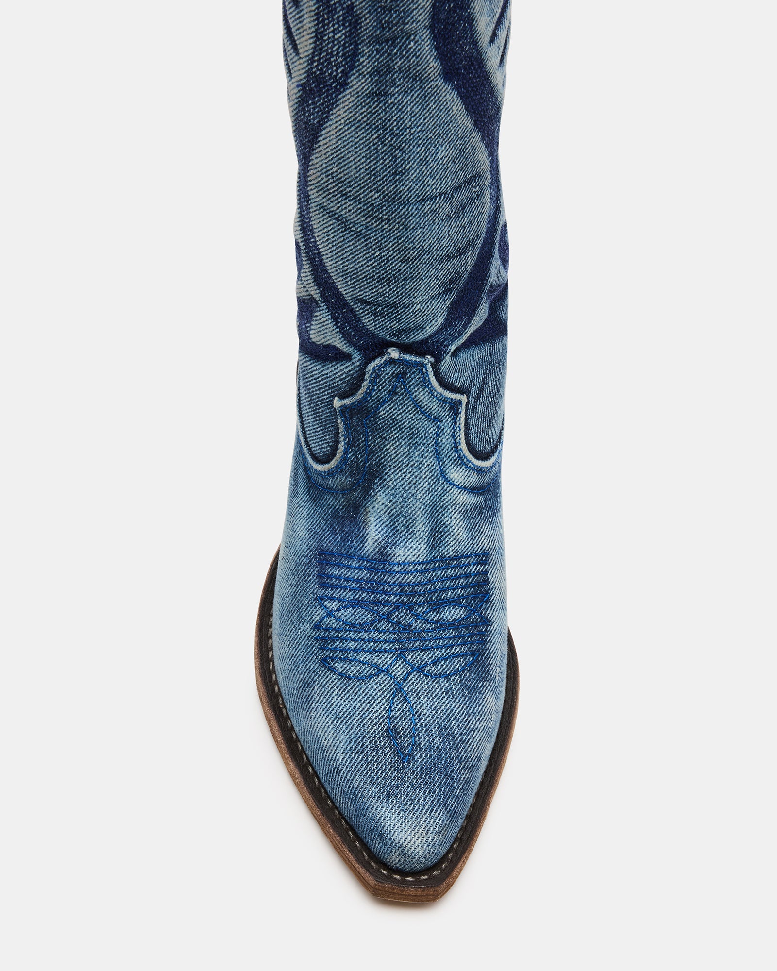 Steve Madden Albany Denim Fabric Western boots featuring a stylish design, pointed toe, and stacked heel.