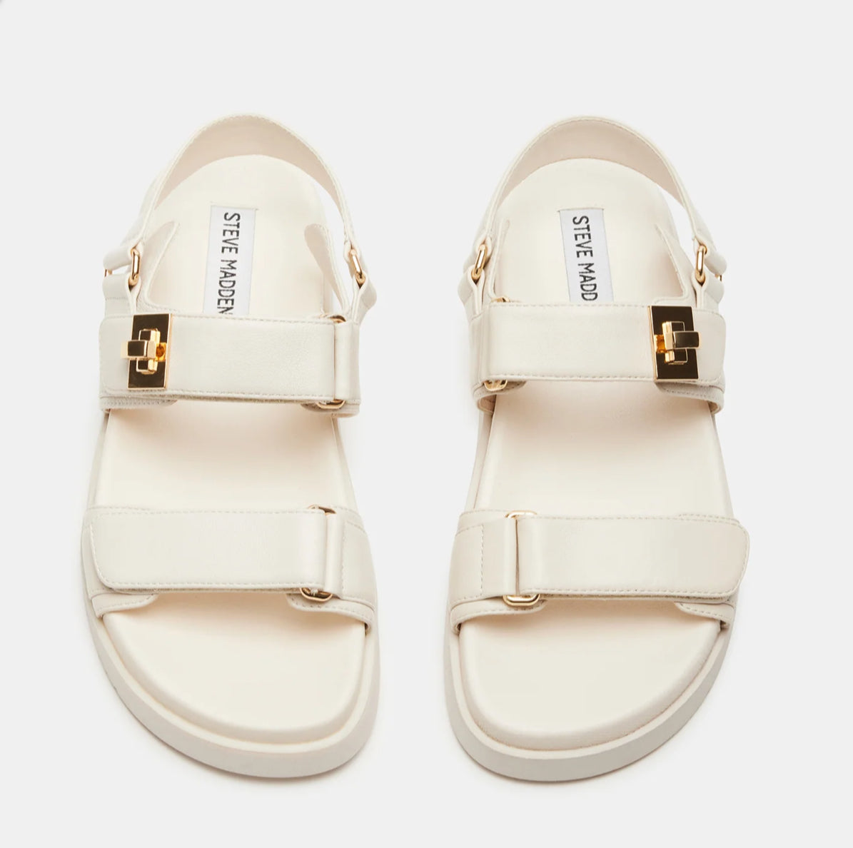 Steve Madden Mona leather sandals, open-toe design with ankle straps, featuring a stylish and comfortable flat sandal look.