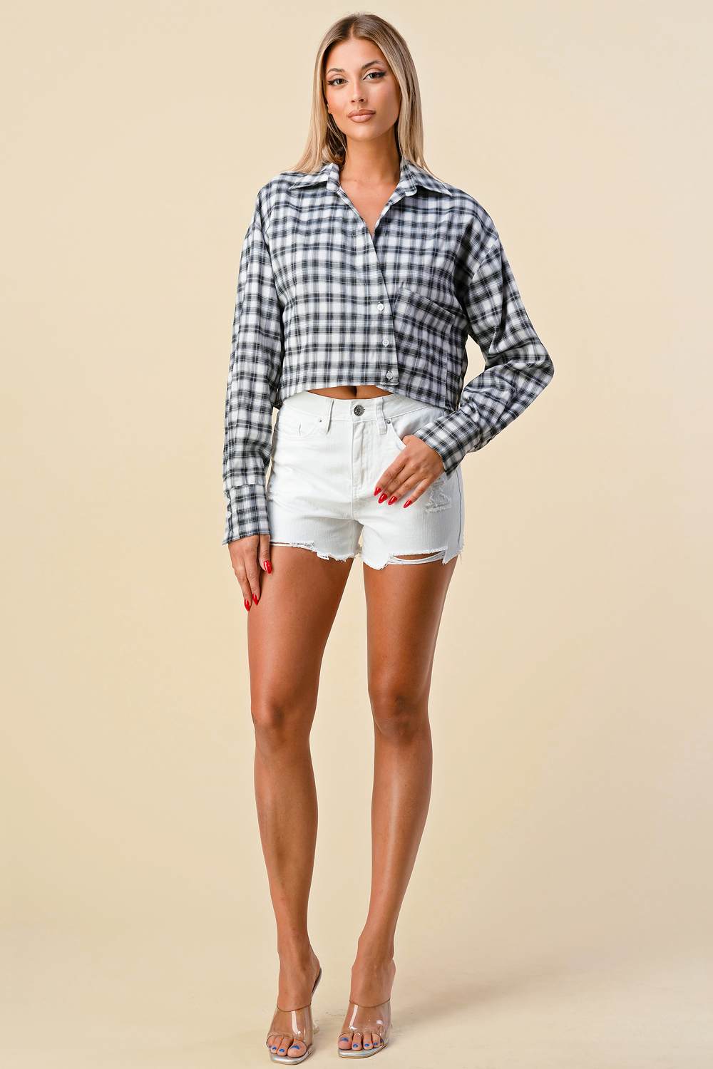 Black and white plaid asymmetric button-front cropped shirt, front view
