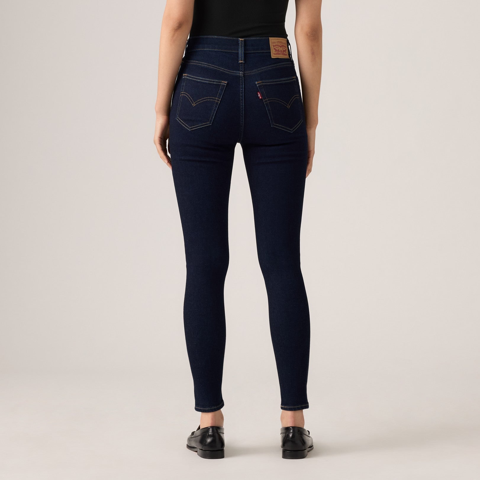 Bella Moda Latina 720 high-rise super skinny women's jeans shown in dark denim with a snug fit and classic five-pocket design.