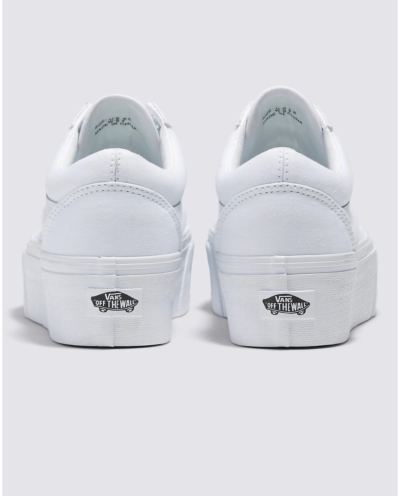 Bella Moda Latina Old Skool Stackform sneakers with black and white design, showcasing stylish casual footwear on a clean background.