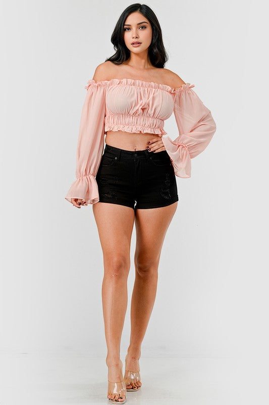 Off shoulder ruffle trim knot sleeve crop top by Bella Moda Latina, featuring a stylish off-shoulder design with ruffles and knot detail.