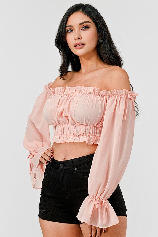 Off shoulder ruffle trim knot sleeve crop top by Bella Moda Latina, featuring feminine ruffles and stylish knot sleeves.