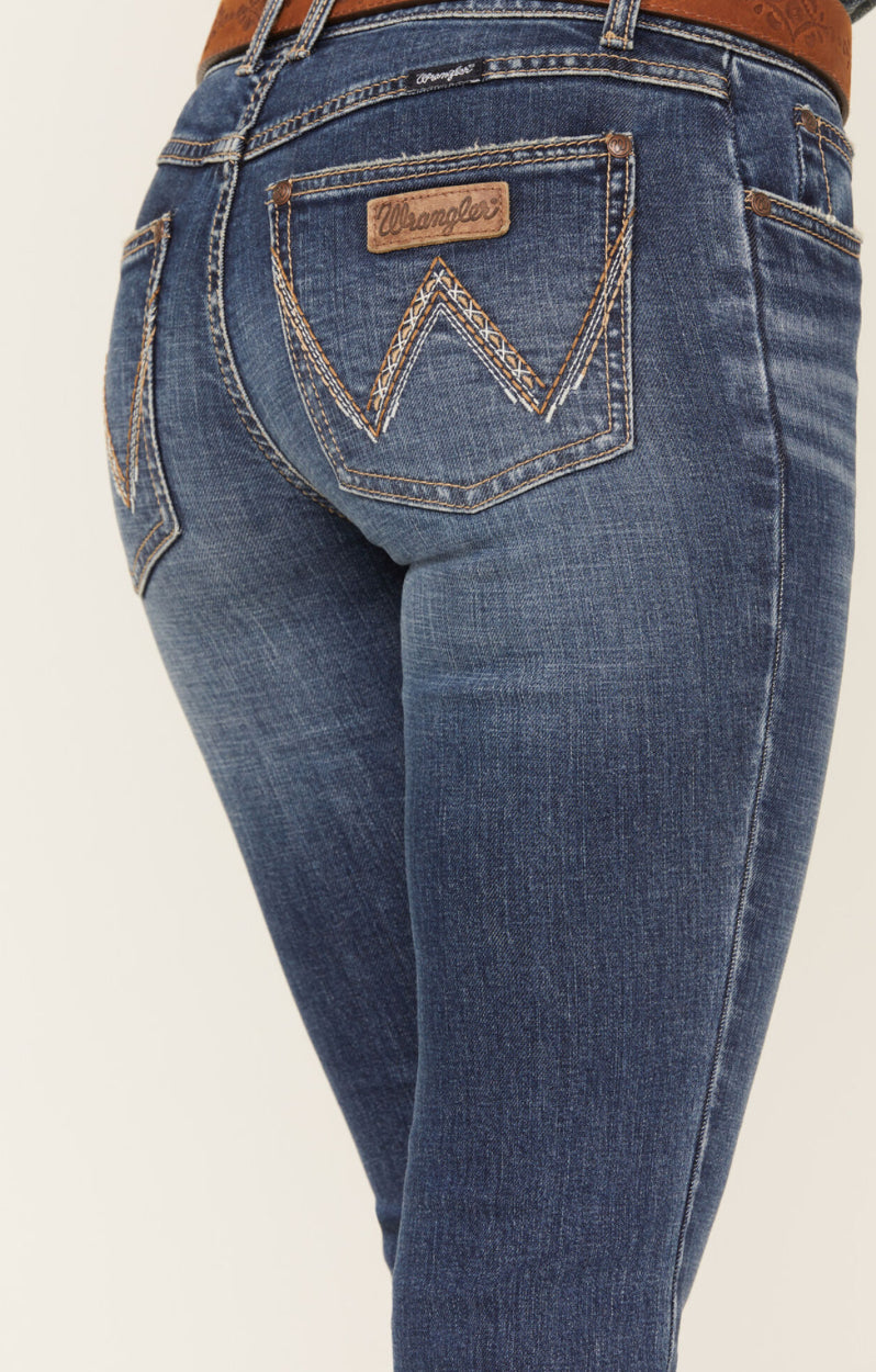 Wrangler Retro Bootcut Jeans in blue denim, featuring a classic fit and subtle stitching details on the back pockets.