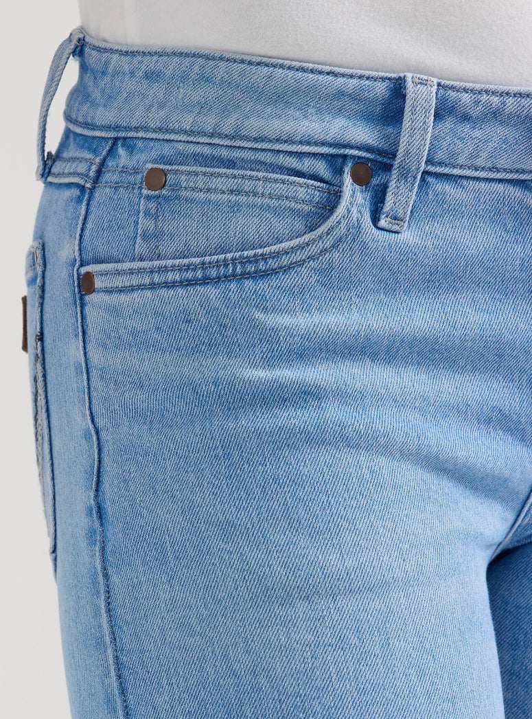 Wrangler Retro Bootcut Jeans featuring a classic fit and stylish denim wash, laid out on a flat surface.