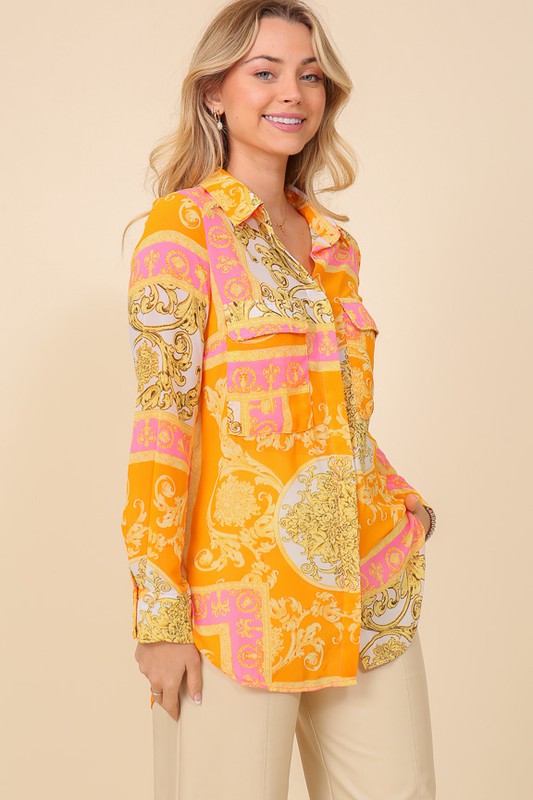 Italian print button-down top by Bella Moda Latina featuring vibrant patterns and a classic collar, displayed on a model.