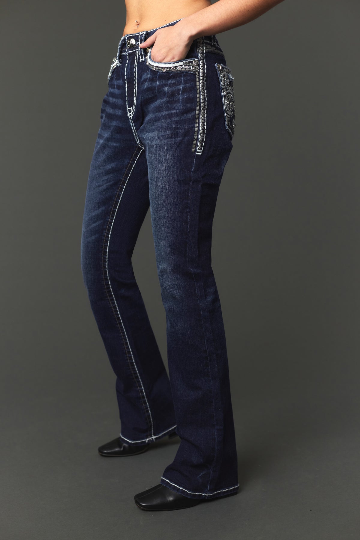 Side-front view of Answer Me A1145 dark-wash embellished bootcut jeans