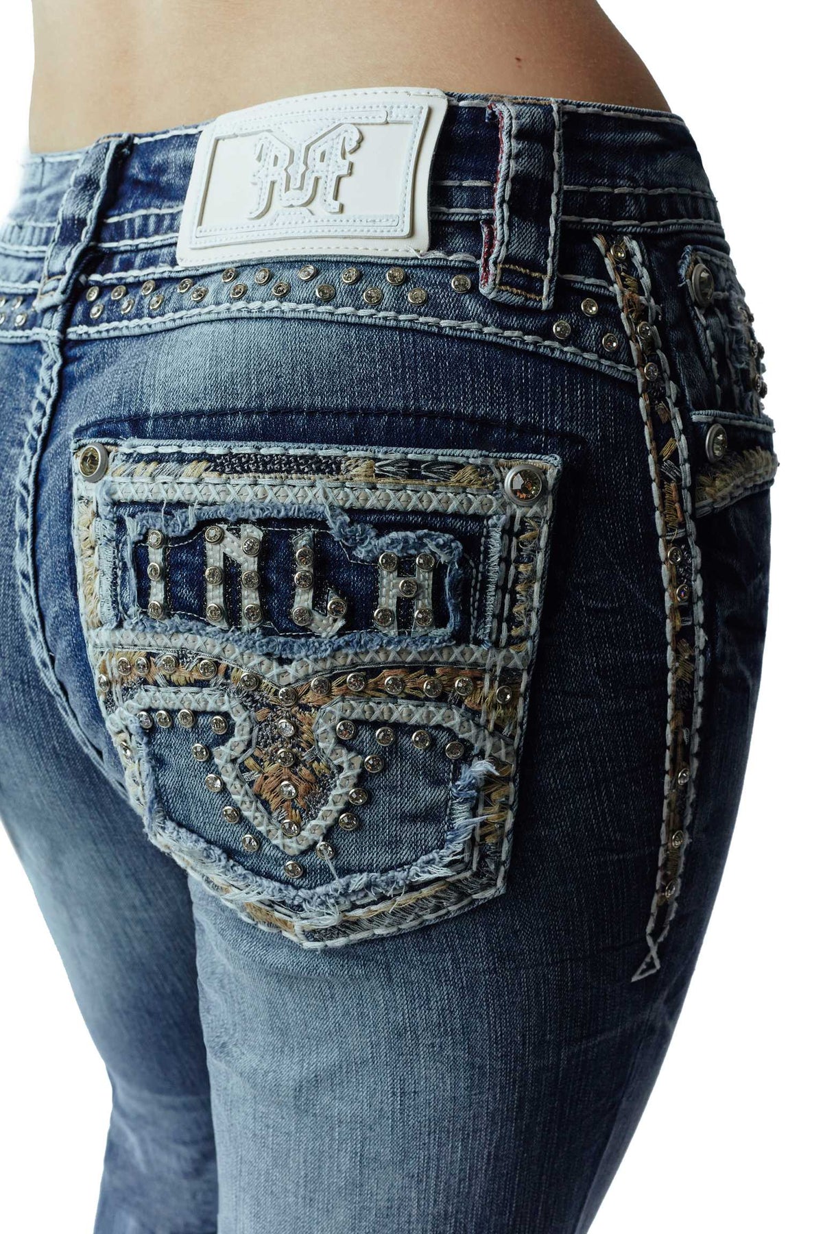 Back pocket tribal embroidery detail on Rock In LA RA9323 medium-wash jeans