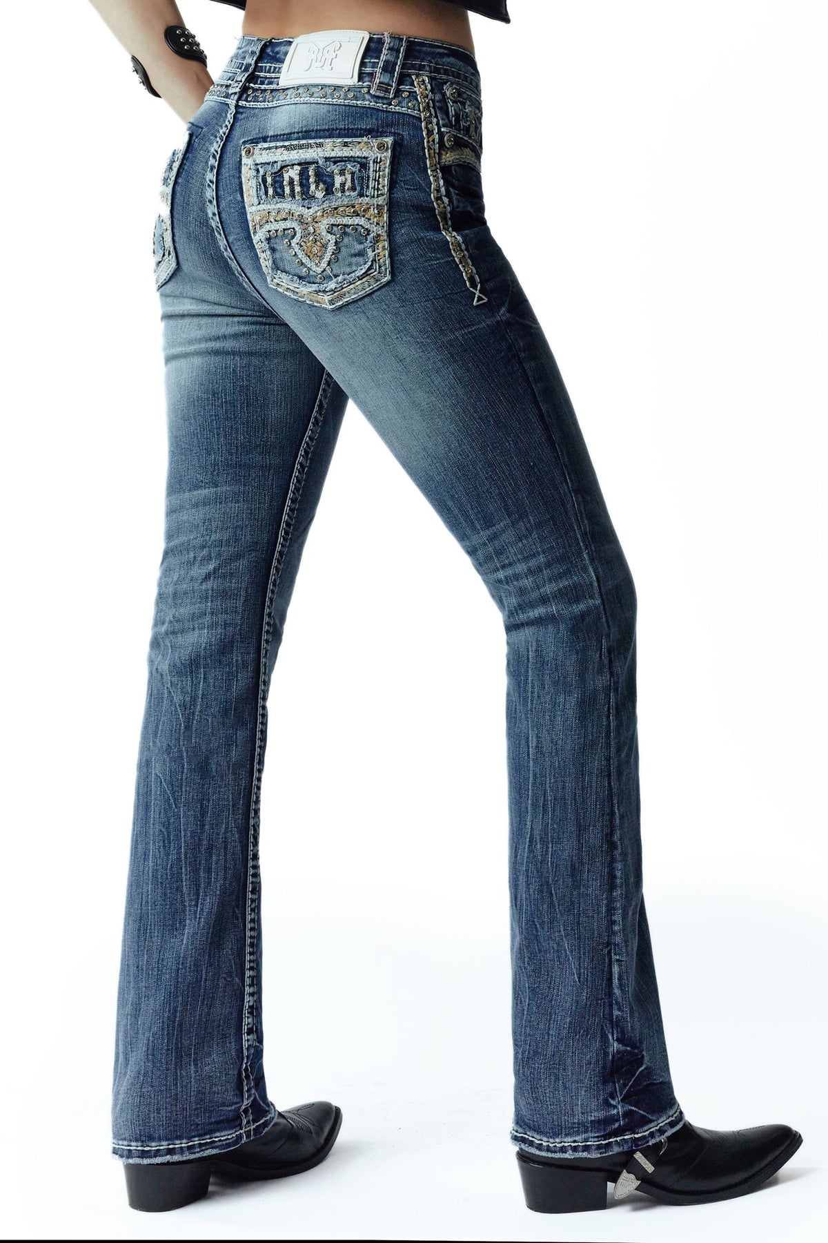 Back three-quarter product view of Rock In LA RA9323 embroidered bootcut jeans