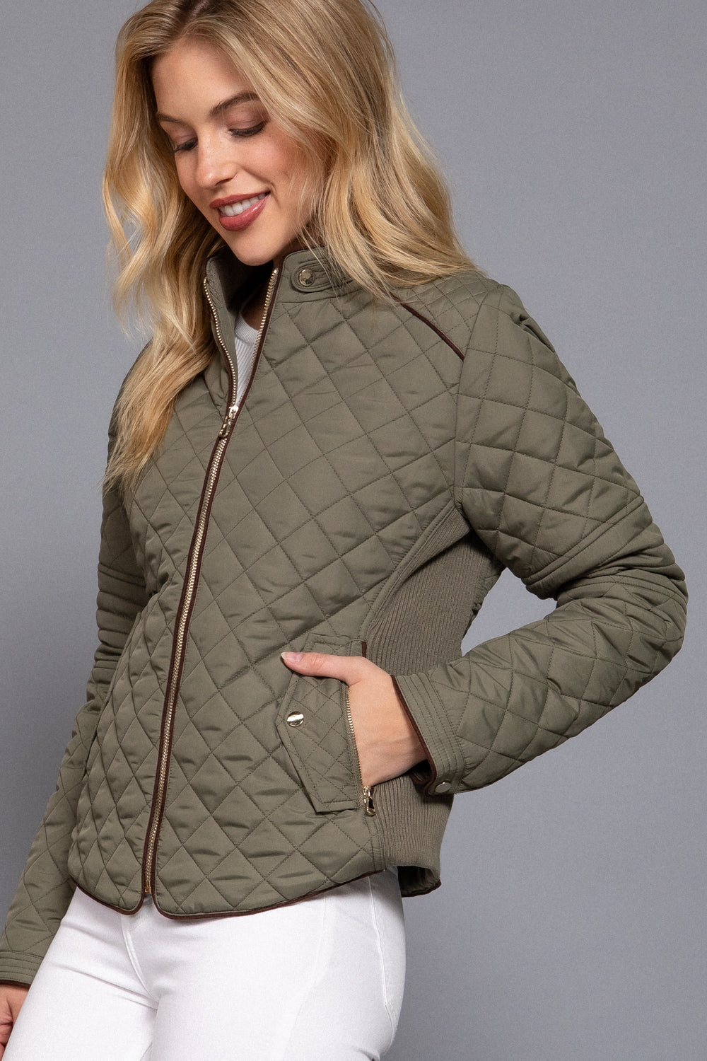 Quilted suede piping jacket in olive oil color by Active USA, showcasing its textured fabric and stylish design.