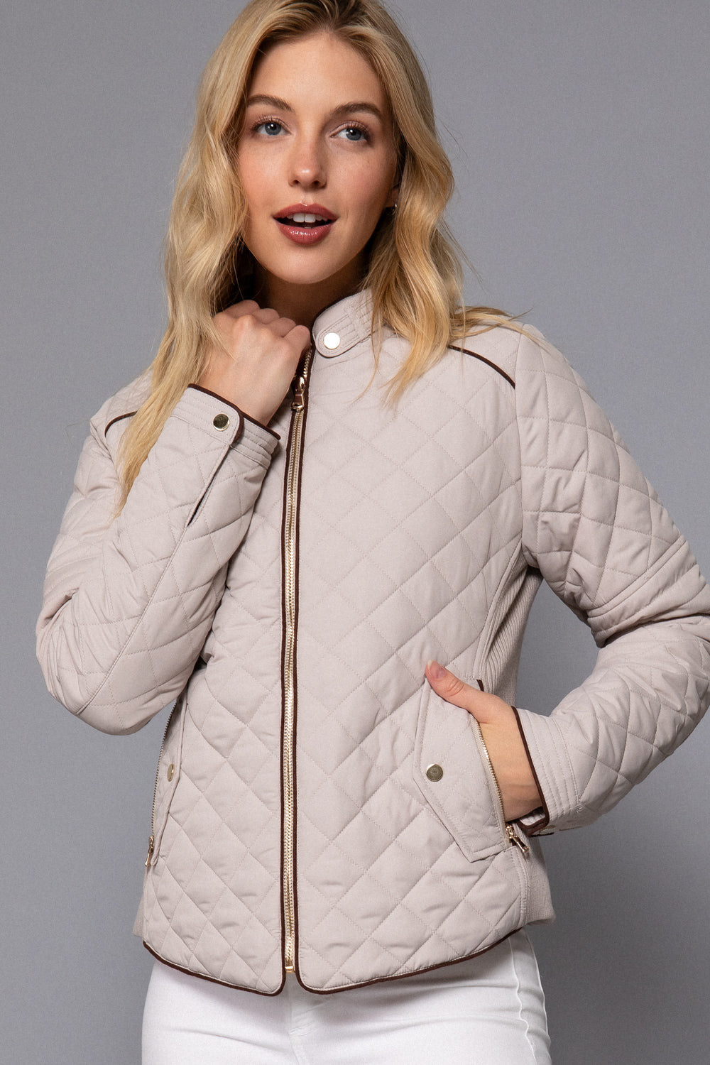 Quilted suede piping jacket by Active USA in taupe with detailed stitching and a stylish, modern silhouette.