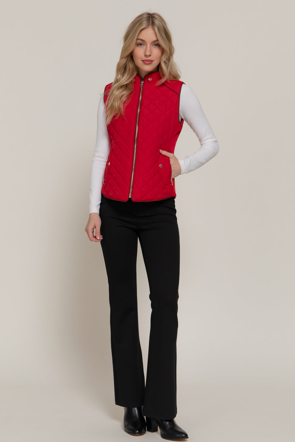 Red suede piping detail quilted padding vest by Active USA, featuring ribbed accents and padded outwear design.