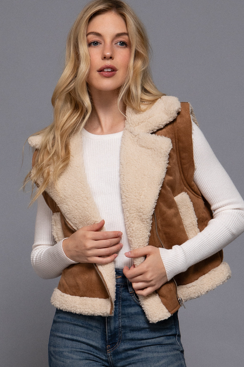 Camel faux suede sherpa-lined zip-up vest by Active USA, showing the vest's front with sherpa lining visible inside.