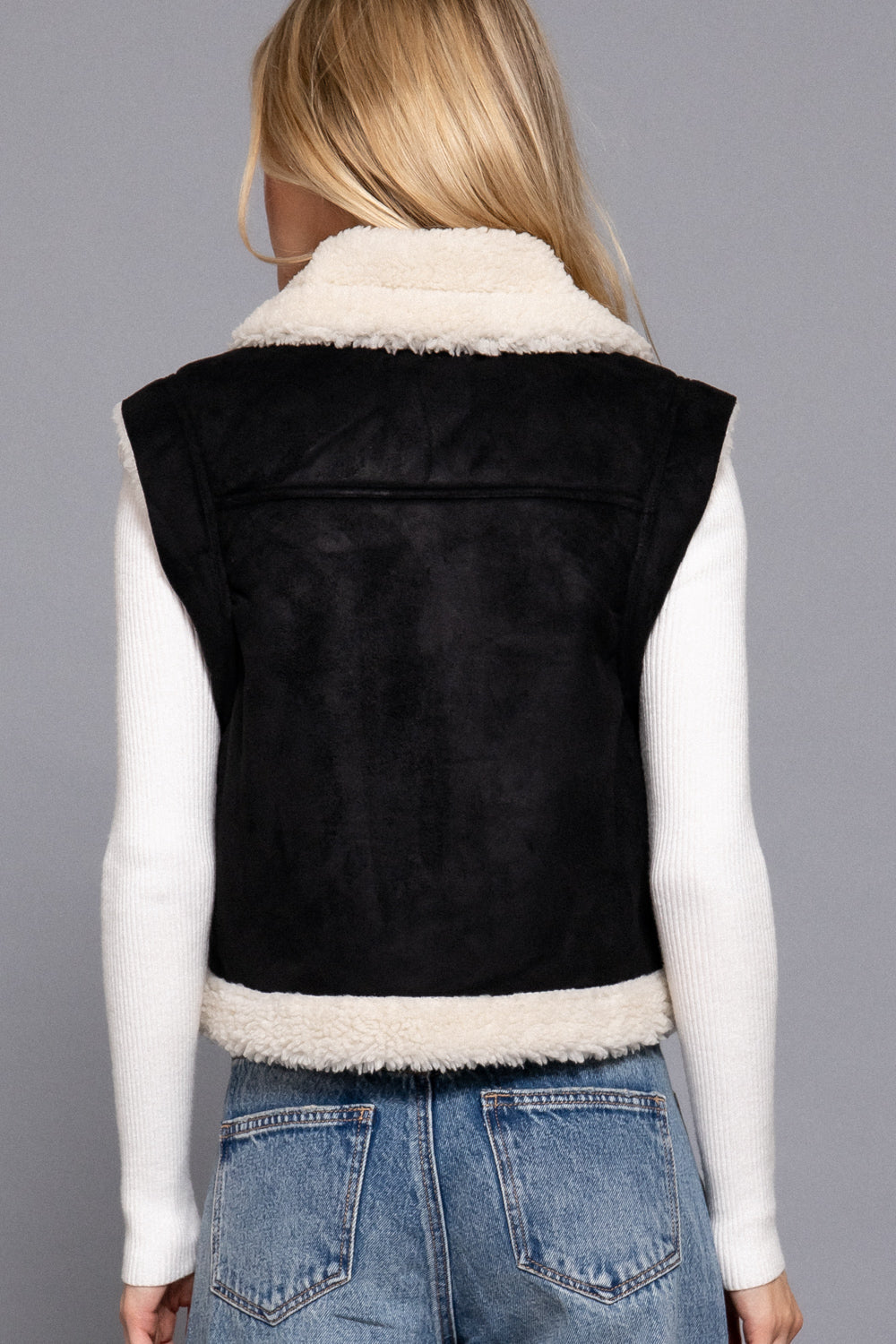 Black faux suede sherpa-lined zip-up vest by Active USA, showing the front view with cozy sherpa lining and stylish design.
