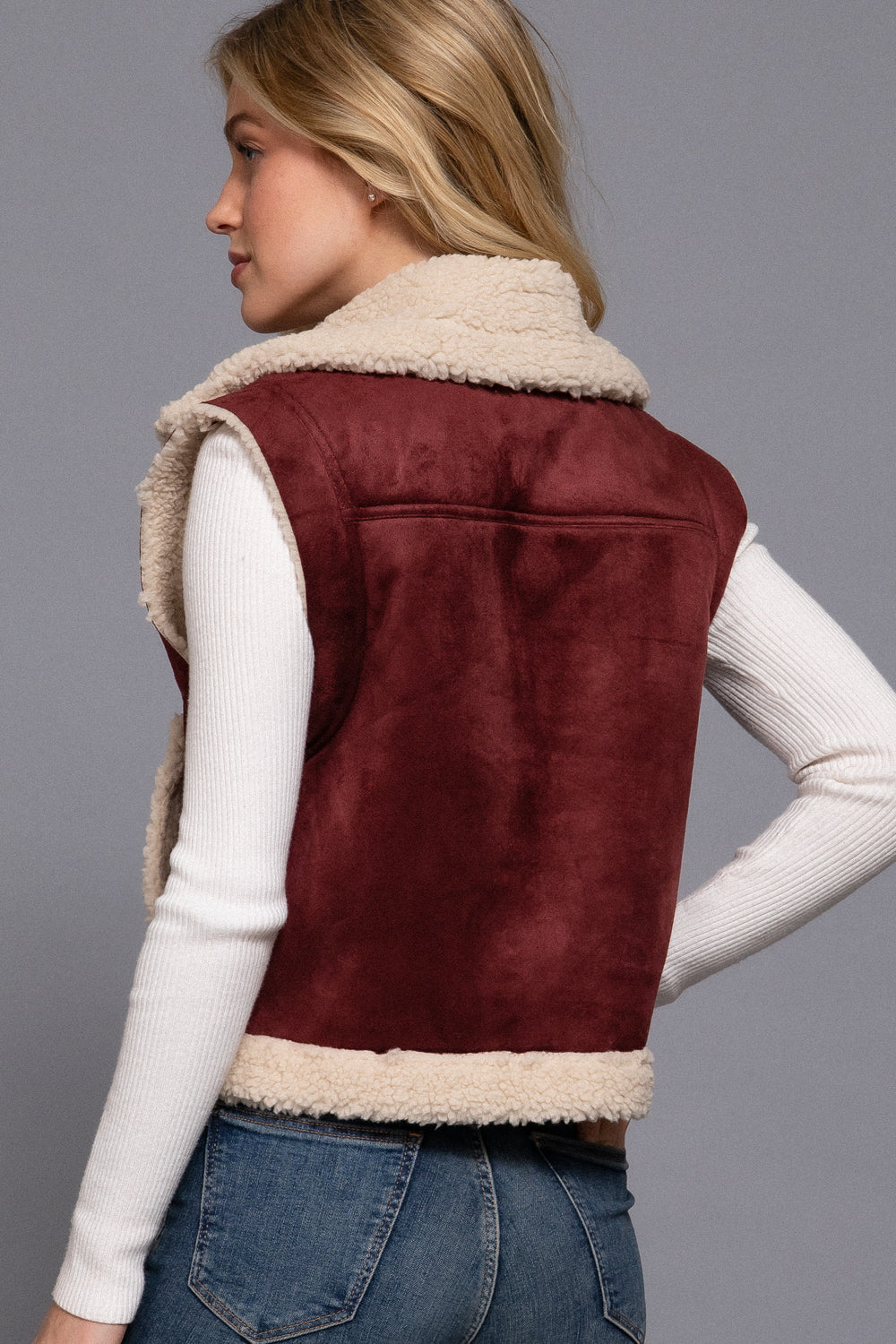 Burgundy faux suede sherpa-lined zip-up vest by Active USA, showcasing its cozy sherpa lining and stylish suede exterior.