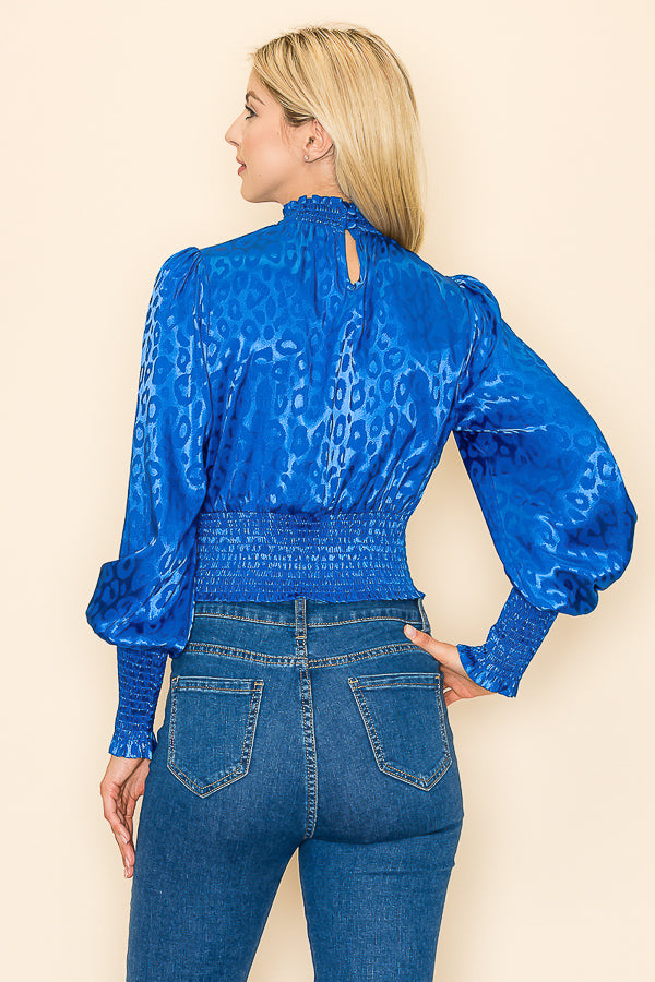 INA mock neck long sleeve top with animal print, stylish and comfortable women's animal print long sleeve shirt.