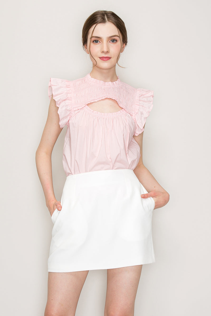 INA cut-out top with flutter sleeves, stylish women's blouse featuring a trendy cut-out design and flowing sleeve detail.