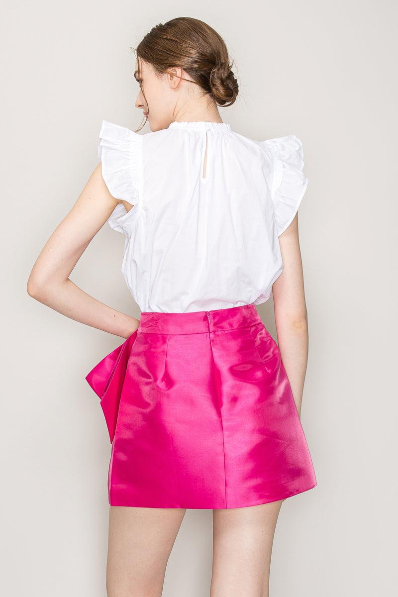 INA cut-out top with flutter sleeves, stylish women's tops featuring a trendy cut-out design and flowy sleeve details.