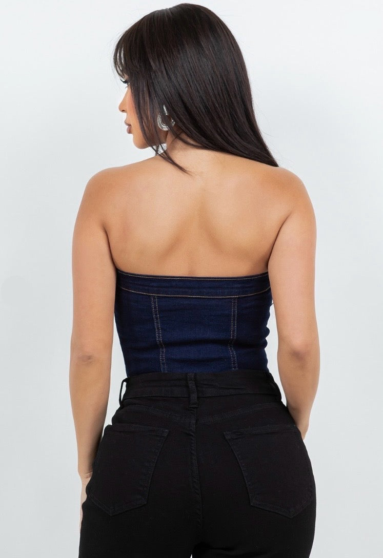 LA Girl denim corset top in strapless bustier style, featuring fitted design and classic blue denim fabric.