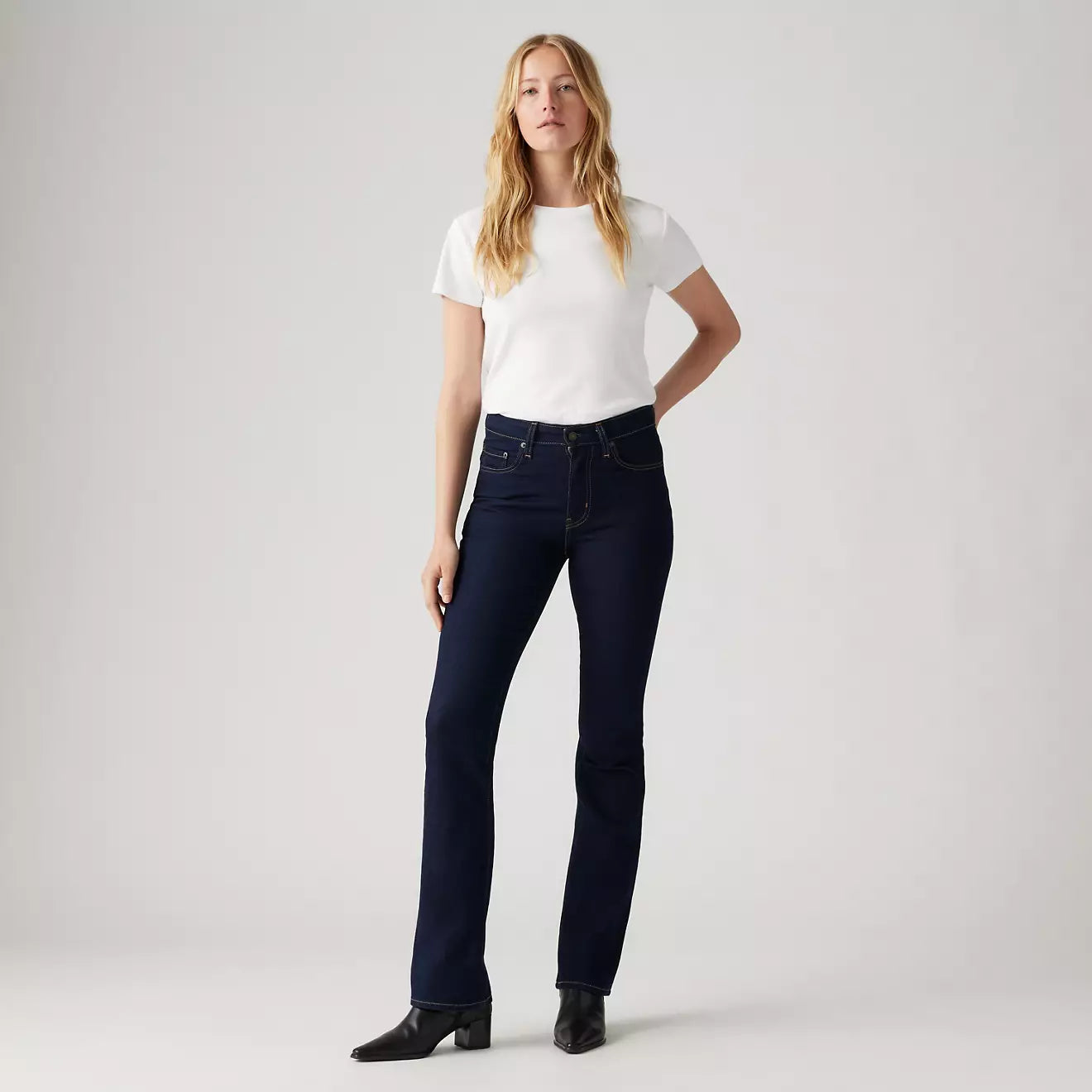 Bella Moda Latina 726 high-rise flare jeans with a stylish fit, shown in a full-length view on a model.