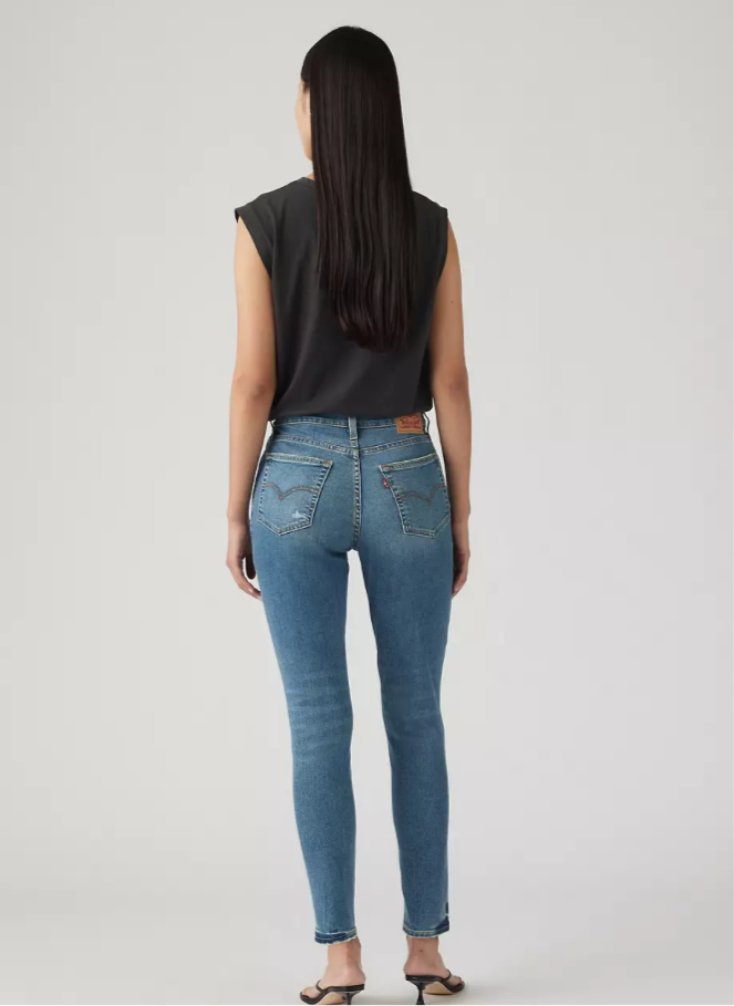 Levi's 721 high-rise skinny jeans in classic denim with a fitted silhouette and five-pocket design.