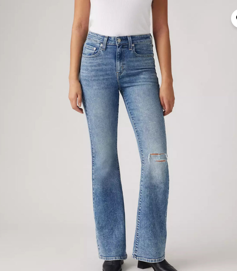 Levi's 726 Flare jeans from Bella Moda Latina, showcasing the high-waisted fit and classic denim style with flare leg design.