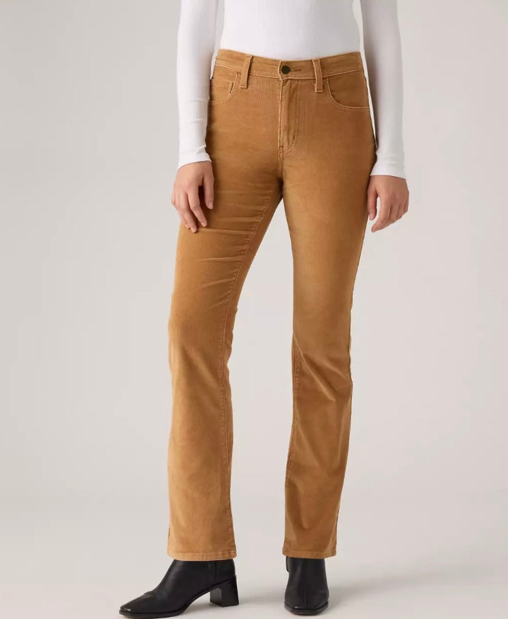 Levi's 725 high-rise bootcut corduroy women's jeans showing a close-up of the rust-colored textured fabric and classic fit.