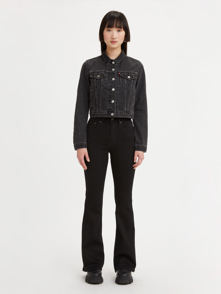 Levi's 726 high-rise flare jeans in Soft Black, full front view on model.
