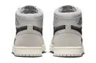 Women's Nike Jordan 1 Hi Zoom CMFT sneakers in Iron Ore color, featuring high-top design and stylish leather accents.
