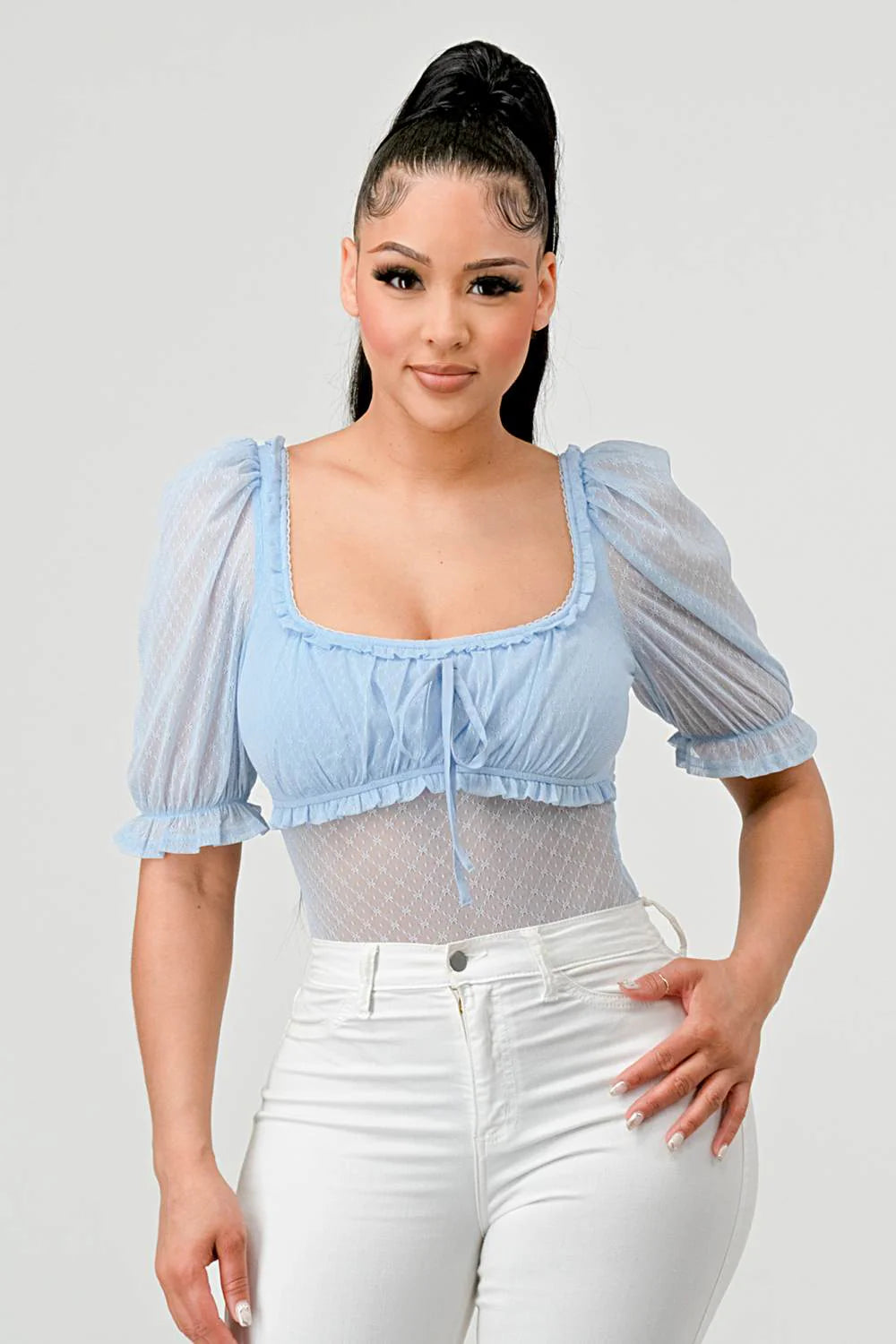 Front view of blue floral-mesh puff-sleeve bodysuit