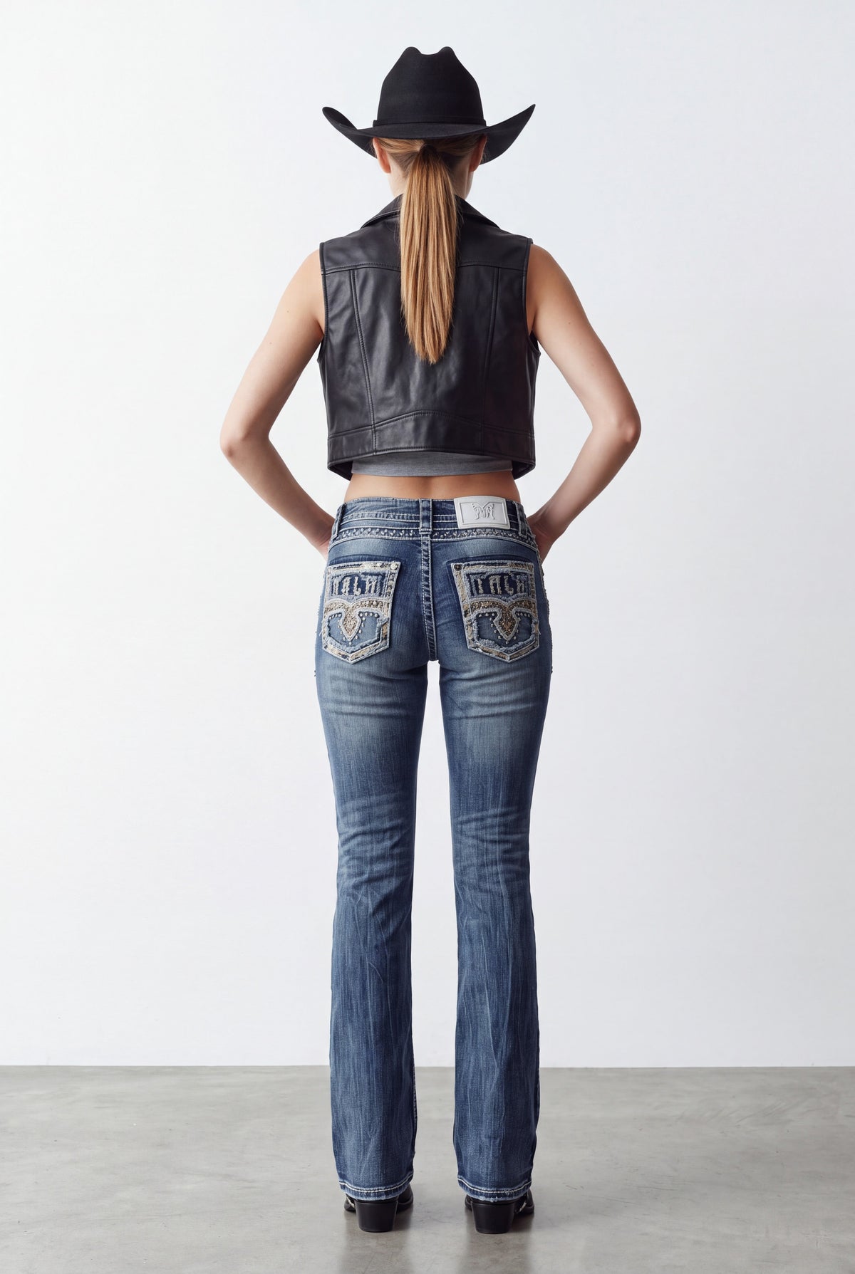 Back model view of Rock In LA RA9323 medium-wash embroidered bootcut jeans