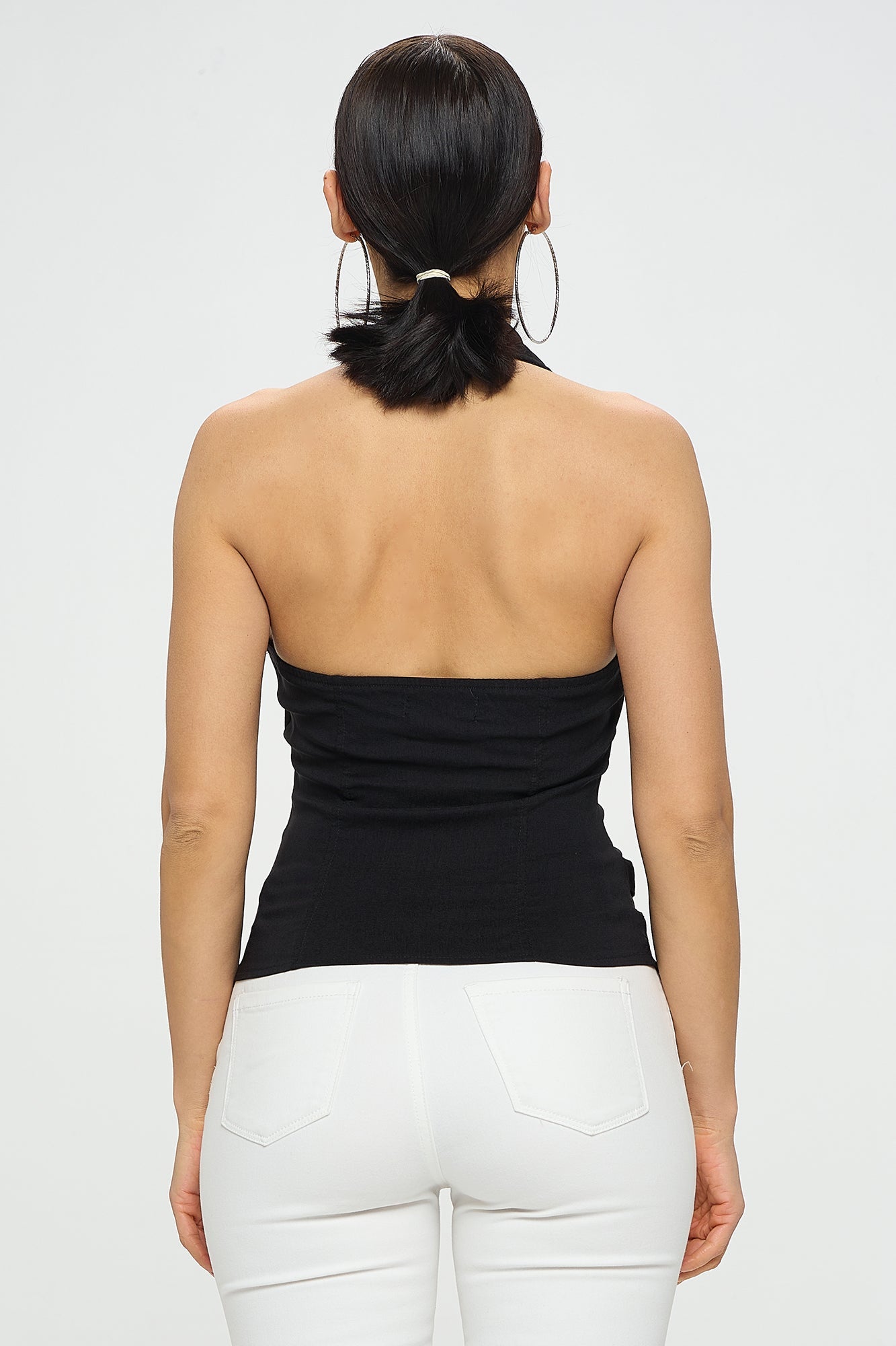 Rogue buckle-detail zip-front halter tank in black, back view