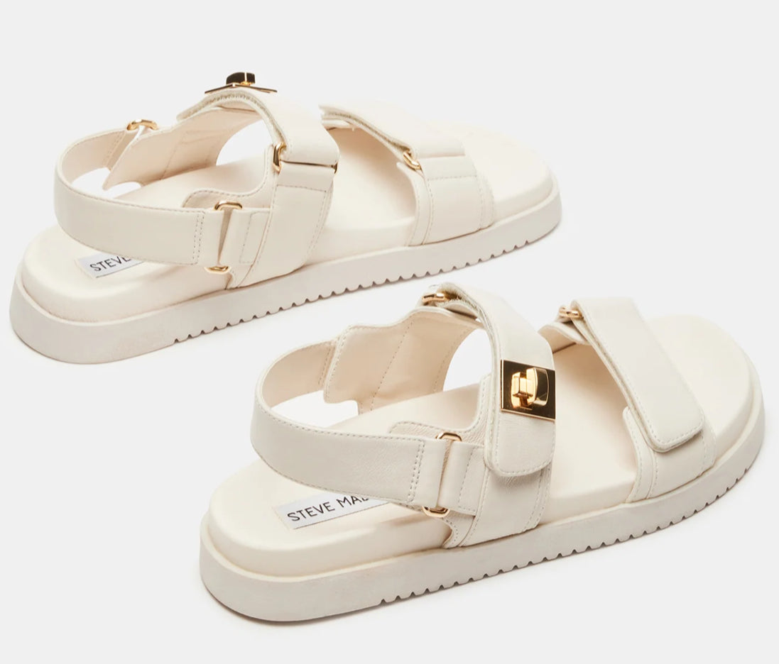 Steve Madden Mona leather sandals with open toe design and ankle strap, featuring a stylish, comfortable fit for warm weather.