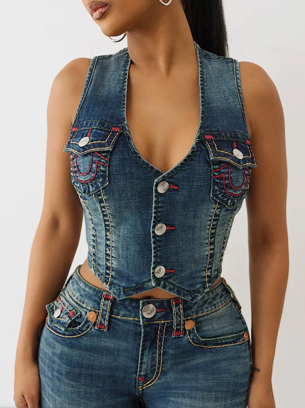 True Religion Super T denim vest showing classic blue jean fabric with metal button closures and a stylish fit.