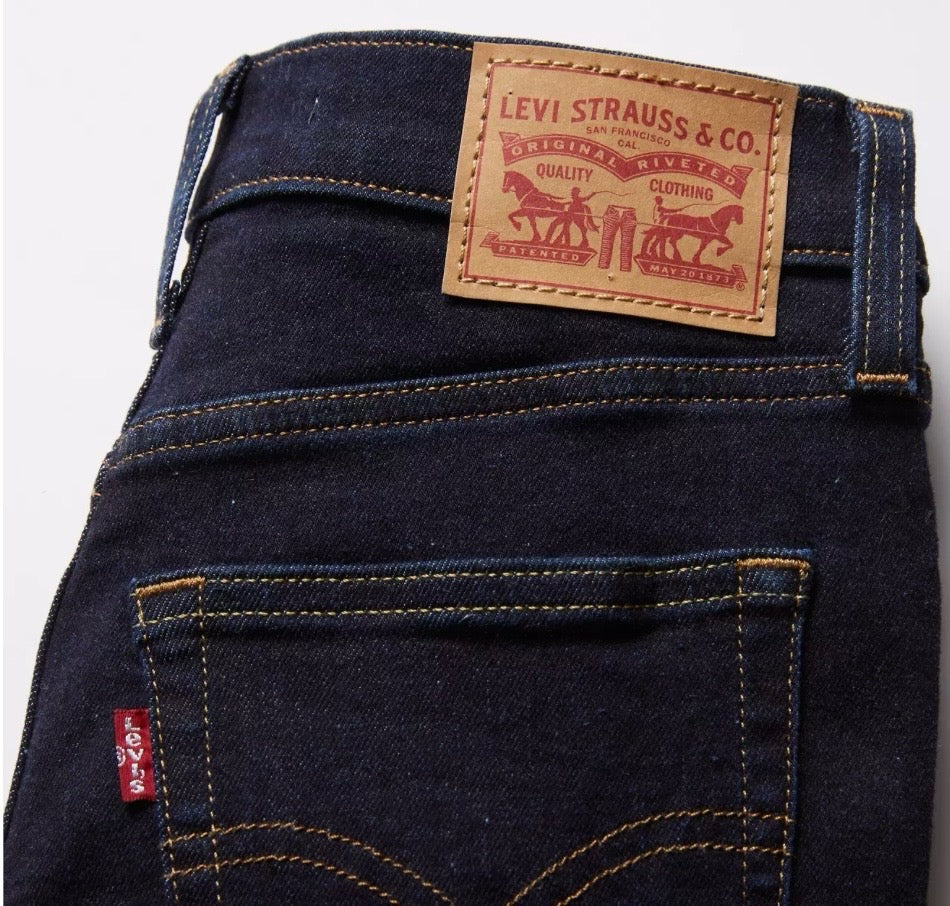 Bella Moda Latina 720 high-rise super skinny women's jeans shown in dark denim with a snug fit and classic five-pocket design.