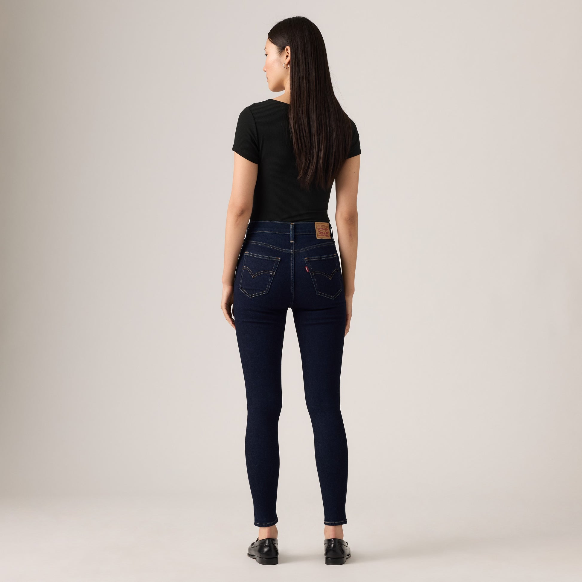 Bella Moda Latina 720 high rise super skinny women's jeans, showcasing a close-up of dark denim fabric and fitted style.